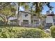 This is an exterior view of the home, featuring mature landscaping at 409 Yacht Harbor Ct # 409, Isle of Palms, SC 29451