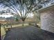 Backyard featuring a patio with bench seating and a large tree that provides shade at 4341 Helene Dr, North Charleston, SC 29418