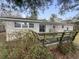 Brick house featuring a spacious backyard and a wooden upper deck at 4341 Helene Dr, North Charleston, SC 29418