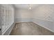 Spacious carpeted living room with natural light from large windows, perfect for entertaining or relaxing at 4341 Helene Dr, North Charleston, SC 29418