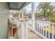Outdoor porch view featuring a staircase with an overhang and white railings at 493 Woodland Shores Rd, Charleston, SC 29412