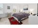 Bright bedroom featuring a cozy bed, stylish decor, and ample natural light at 493 Woodland Shores Rd, Charleston, SC 29412