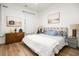 Comfortable bedroom with neutral decor, wood floors, and modern furnishings at 493 Woodland Shores Rd, Charleston, SC 29412