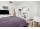 Comfortable bedroom with an ensuite bathroom, and a desk area at 493 Woodland Shores Rd, Charleston, SC 29412