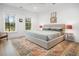Bright bedroom with a large bed, plush rug, and windows providing ample natural light at 493 Woodland Shores Rd, Charleston, SC 29412