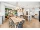 Open-concept dining room adjacent to kitchen and living room for easy entertaining at 493 Woodland Shores Rd, Charleston, SC 29412