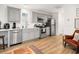 Charming kitchen with stainless steel appliances, light gray cabinetry, and subway tile backsplash at 493 Woodland Shores Rd, Charleston, SC 29412