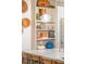 Kitchen with marble countertops, open shelving, and built-in organizers at 493 Woodland Shores Rd, Charleston, SC 29412