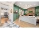 Open-concept living room featuring hardwood floors, a cozy fireplace, and access to the kitchen at 493 Woodland Shores Rd, Charleston, SC 29412
