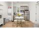 Bright living space with dining area featuring modern appliances and fixtures at 493 Woodland Shores Rd, Charleston, SC 29412