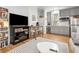 Cozy living space with a dining table, bookshelf, and a view of the kitchen area at 493 Woodland Shores Rd, Charleston, SC 29412