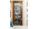 Pantry with custom stained glass doors, and ample storage space at 493 Woodland Shores Rd, Charleston, SC 29412