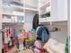 Walk-in closet providing ample storage with multiple shelves, hanging racks, and storage bins at 493 Woodland Shores Rd, Charleston, SC 29412
