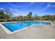 Large community pool with clear blue water and plenty of seating at 5073 Blair Rd, Summerville, SC 29483