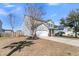 Two-story home with attached garage, a well-manicured lawn and driveway at 5073 Blair Rd, Summerville, SC 29483