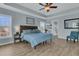 Light and airy main bedroom with tray ceilings, two windows, and an ensuite bathroom at 5073 Blair Rd, Summerville, SC 29483