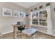 Bright office with wood flooring, natural light, and functional furniture at 5073 Blair Rd, Summerville, SC 29483