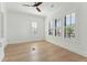 Bedroom with natural light from plantation shutters and hardwood flooring at 509 Seven Farms Dr, Charleston, SC 29492