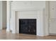 Modern fireplace with a white mantle, adding a touch of elegance to the room at 509 Seven Farms Dr, Charleston, SC 29492
