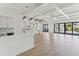 Spacious kitchen with hardwood floors, large island, and easy access to backyard at 509 Seven Farms Dr, Charleston, SC 29492