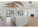 Large kitchen with island sink, hardwood floors, and an open layout at 509 Seven Farms Dr, Charleston, SC 29492