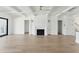 Spacious living room with fireplace and hardwood floors at 509 Seven Farms Dr, Charleston, SC 29492
