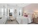 Charming bedroom featuring a cozy bed, elegant decor, and plenty of natural light from the window at 542 Richfield Way, Summerville, SC 29486