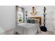 Bright bedroom featuring a comfortable bed, playful nautical decor and plenty of natural light at 542 Richfield Way, Summerville, SC 29486