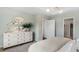 Serene bedroom featuring a stylish dresser with decorative mirror and a cozy bed with soft linens at 542 Richfield Way, Summerville, SC 29486