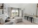 Bright living room featuring a comfortable couch, stylish furniture and plenty of natural light at 542 Richfield Way, Summerville, SC 29486