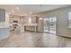 Open-concept kitchen features modern appliances, stylish cabinets, and sliding glass doors leading to the outdoor space at 548 Richfield Way, Summerville, SC 29486