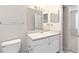 Bathroom with white vanity, modern sink and faucet, a large mirror, and tiled flooring at 60 Fenwick Hall Allee # 521, Johns Island, SC 29455