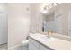 Bathroom with white vanity, modern sink and faucet, a large mirror, and tiled flooring at 60 Fenwick Hall Allee # 521, Johns Island, SC 29455