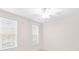 Bedroom featuring neutral carpet, a ceiling fan, and windows with blinds at 60 Fenwick Hall Allee # 521, Johns Island, SC 29455