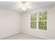 Bright bedroom with a large window, neutral carpet and natural light, creating a peaceful atmosphere at 60 Fenwick Hall Allee # 521, Johns Island, SC 29455