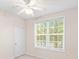 Bright bedroom featuring carpet, a ceiling fan, and large windows providing ample natural light at 60 Fenwick Hall Allee # 521, Johns Island, SC 29455