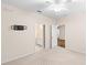Bedroom with neutral carpet, a ceiling fan, and doorways leading to the bathroom and other rooms at 60 Fenwick Hall Allee # 521, Johns Island, SC 29455