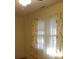 Bedroom featuring floral curtains and a large window providing natural light at 668 Rutledge Ave, Charleston, SC 29403