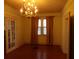 Dining area with French doors and hardwood floors, connecting to other rooms at 668 Rutledge Ave, Charleston, SC 29403