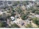 Aerial view of a residential neighborhood with tree-lined streets and varied housing styles at 727 Spark St, Mount Pleasant, SC 29464