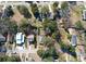 Aerial view of a residential neighborhood with tree-lined streets at 727 Spark St, Mount Pleasant, SC 29464