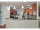 Modern kitchen with stainless appliances, granite countertops, and ample cabinet space at 7753 Kinston St, North Charleston, SC 29418
