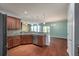 Open kitchen with modern appliances and view of the living and dining areas at 7753 Kinston St, North Charleston, SC 29418