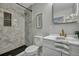 Elegant bathroom with a marble shower, vanity and a stylish mirror at 828 Longbranch Dr, Charleston, SC 29414
