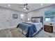 Comfortable bedroom with a plush bed, wooden floor, and a calming atmosphere at 828 Longbranch Dr, Charleston, SC 29414