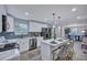 Modern kitchen featuring an island with seating and stainless steel appliances at 828 Longbranch Dr, Charleston, SC 29414