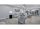 Spacious living room with hardwood floors, neutral decor, and seamlessly connecting to the kitchen at 828 Longbranch Dr, Charleston, SC 29414