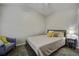 Cozy bedroom featuring a queen-size bed, ample lighting, and a chair for relaxed living at 901 Elm Hall Cir, Summerville, SC 29483