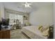 Comfortable bedroom featuring a cozy atmosphere with large window and neutral decor at 901 Elm Hall Cir, Summerville, SC 29483