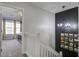 Bright hallway featuring modern lighting, staircase, and decor at 901 Elm Hall Cir, Summerville, SC 29483